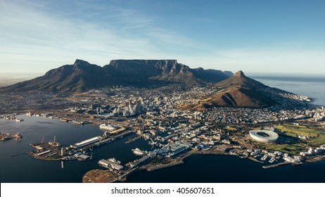 Aerial coastal view of cape town city with table mountain, cape town harbour, lions head and devils peak, South africa. - Shutterstock ID 405607651