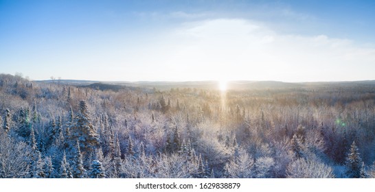 Aerial Cold Morning Over Winter Forest - Northern Ontario Canada