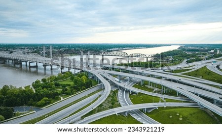 Aerial crisscrossing highway system in Louisville Kentucky leading to bridges over Ohio River