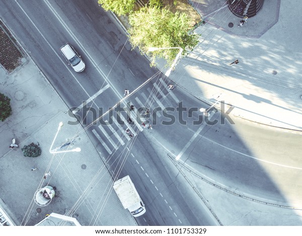 aerial crosswalk in\
the city top down view