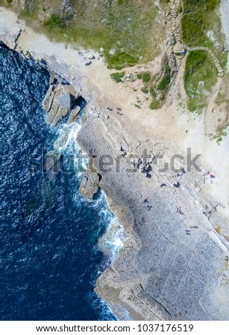 Similar – Aerial Drone View Of Dramatic Ocean Waves Crushing On Rocky Landscape