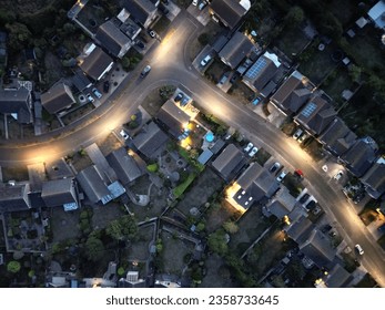 An aerial of a densely populated residential area with its main road