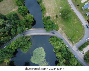 Aerial Down View Of Bridge On A River In Hoddesdon With Clear Tranquil Water