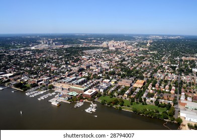 Aerial of downtown Alexandria, Virginia, on the Potomac River, near Washington DC, with a view of King Street leading from Waterfront Park to George Washington Masonic Memorial