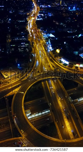 Aerial\
drone bird\'s eye night photo of ring road at\
night