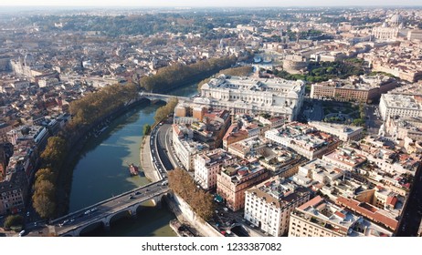 Aerial drone bird's eye panoramic view of iconic neoclassic building of Supreme Court of Cassation (Italian: Corte Suprema di Cassazione) next to famous Cavour square and river of Tiber, Rome, Italy - Shutterstock ID 1233387082