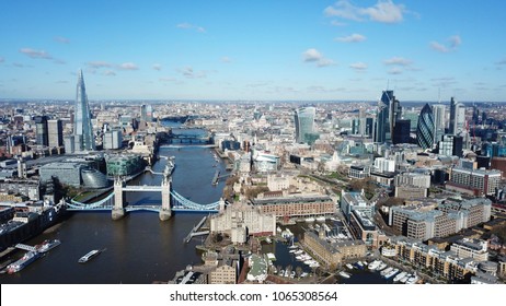 Aerial Drone Bird's Eye View Of Iconic Tower Bridge, The Shard And Skyline In City Of London, United Kingdom