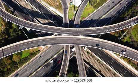 Aerial Drone Bird's Eye View Photo Of Latest Technology Cross Shape Multi Level Road Highway Passing Through City Centre