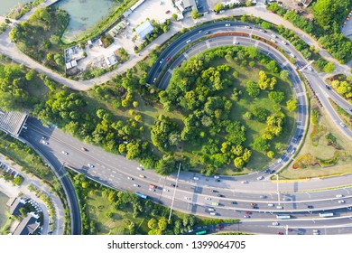 Aerial Drone Bird's Eye View Of Multi Level Road Highway Passing Through Urban City.