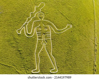 Aerial drone. Cerne Abbas Giant, Dorset. Hill figure carved out of chalk. 55 meters high. Depicts a standing nude male with prominent manhood.