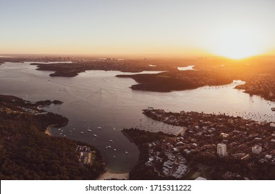 Aerial Drone Evening View Of The Sydney Suburb Of Manly (& Little Manly & Collins Beach), A Beach-side Suburb Of Northern Sydney, New South Wales, Australia. Sydney Harbour & City In The Background.