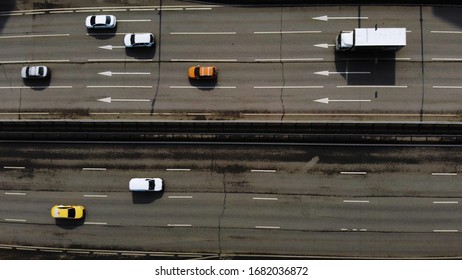 Aerial drone flight over road traffic. Static shot of motorway