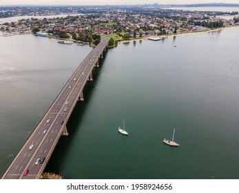 Aerial Drone Image Of Captain Cook Bridge Over Georges River In The Suburb Of Sans Souci, Suburban Sydney, New South Wales