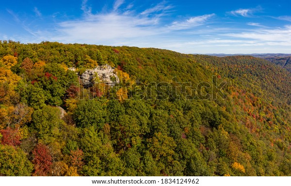 Stock photo of aerial drone shot of Coopers Rock overlook and forests in autumn colors
