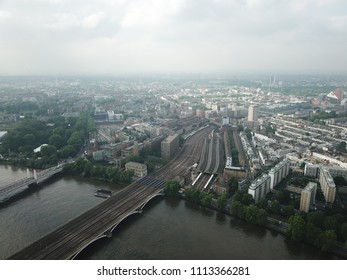 Aerial Drone Image Of London England And The River Thames On A Clear Sunny Day.  Skyscrapers Shape The London Skyline Looking East.