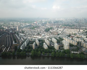 Aerial Drone Image Of London England And The River Thames On A Clear Sunny Day.  Skyscrapers Shape The London Skyline Looking East.