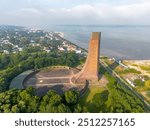 Aerial drone image of the naval memorial for fallen navy mariners in Laboe Germany near Kiel. Brick monument in soft morning light