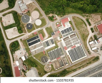 Aerial Drone Image, Top Down, Of A Water Reclamation Plant (sewage Treatment) With Bioreactors And Filtration Pools.