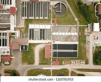 Aerial Drone Image, Top Down, Of A Water Reclamation Plant (sewage Treatment) With Bioreactors And Filtration Pools.