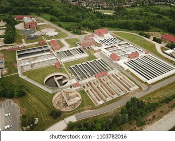 Aerial Drone Image, Top Down, Of A Water Reclamation Plant (sewage Treatment) With Bioreactors And Filtration Pools.