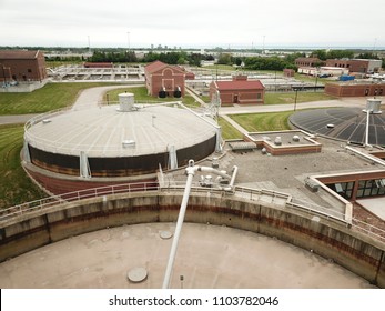 Aerial Drone Image, Top Down, Of A Water Reclamation Plant (sewage Treatment) With Bioreactors And Filtration Pools.