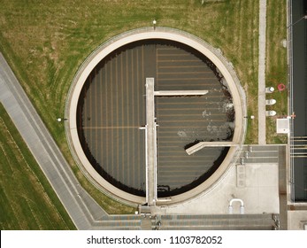 Aerial Drone Image, Top Down, Of A Water Reclamation Plant (sewage Treatment) With Bioreactors And Filtration Pools.