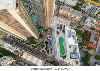 Aerial Drone Inspection Of A Rooftop Pool City Highrise Tower