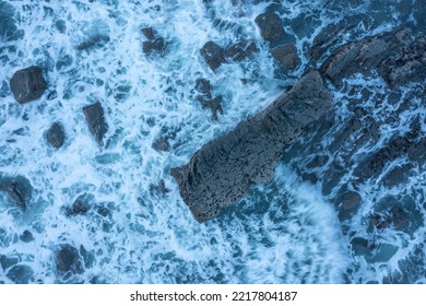 Aerial Drone Landscape Bird's Eye View Of Sunset Over Welcombe Mouth Beach In Devon England