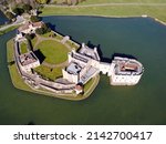 Aerial drone. Leeds Castle in Maidstone, Kent, England. It is built on islands in a lake formed by the river Len.