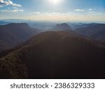 aerial (drone) panorama of green mountains section in lamington national park, queensland, australia; ancient gondwana rainforest in mountains near brisbane and gold coast
