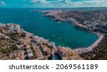 Aerial drone panorama of Saint paul bay in Malta on a sunny autumn day. Famous st. paul