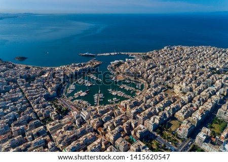 Aerial drone panoramic photo of Piraeus and Marina of Zea (pasalimani) in daylight, Attica, Greece.