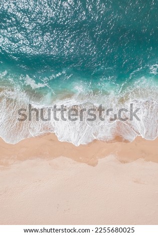Aerial drone photo of beach sand and the ocean