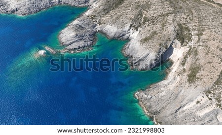 Aerial drone photo of beautiful turquoise beach and cave formations visited by yachts and sailboats in Southern part of Antiparos island, Cyclades, Greece Foto stock © 