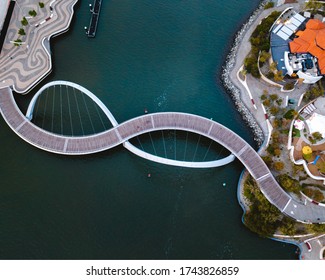 Aerial drone photo of the Elizabeth Quay Bridge in the middle of Perth, Western Australia. 