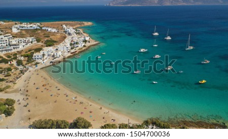 Aerial drone photo of famous sandy turquoise beach of Ammos near main port of Koufonisi island, Small Cyclades, Greece