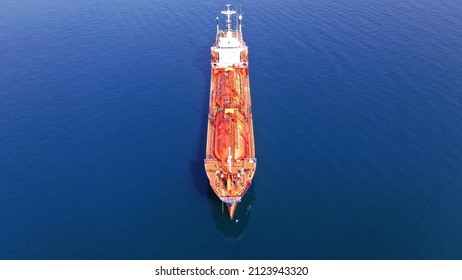 Aerial drone photo of gas carrier tanker boat or LPG (Liquefied Petroleum Gas) tanker anchored near Mediterranean port