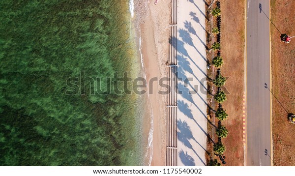 Aerial drone\
photo of go cart track next to popular sandy beach by the sea,\
Agios Kosmas, Elliniko, Attica,\
Greece