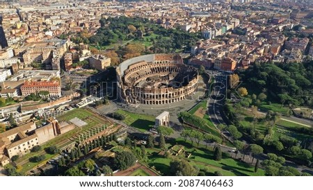 Aerial drone photo of iconic ancient Roman Gladiatorial arena world famous Colosseum, Rome historic centre, Italy