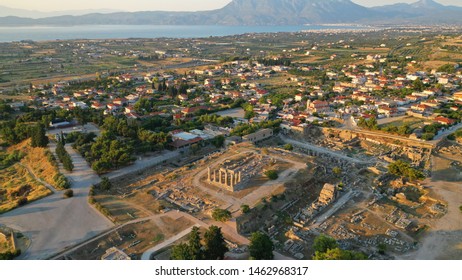 Aerial drone photo of iconic archaeological site of Ancient Corinth built in the slopes of Acrocorinth, Peloponnese, Greece