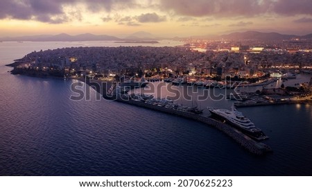 Aerial drone photo of iconic round port and Marina of Zea or Passalimani at dusk with beautiful colours, Piraeus, Attica, Greece
