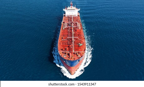 Aerial Drone Photo Of Industrial Crude Oil - Fuel Tanker Ship Cruising Deep Blue Mediterranean Sea