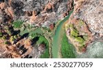 Aerial drone photo of lake and dam of Marathon after mega fires of Athens in August 2024, Attica, Greece