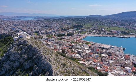 Aerial drone photo of main town of Salamina island as seen from small uphill chapel of Profitis Ilias, Saronic gulf, Greece