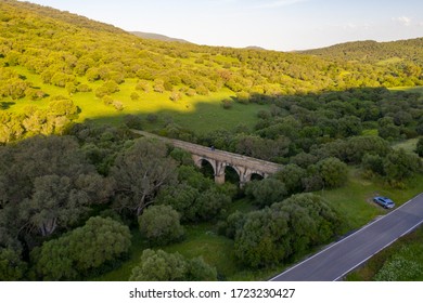 Aerial Drone Photo Of Nature Preservered Park With An Old Midevil Bridge In Spain