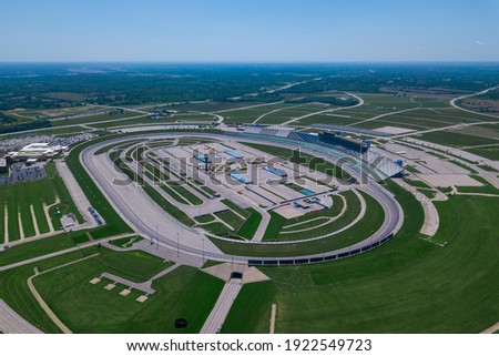 Aerial drone photo of an oval auto speedway for racing.