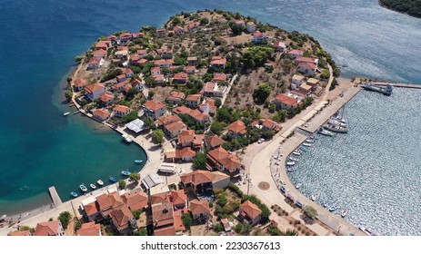 Aerial drone photo of picturesque small island of Trizonia the only inhabited island in Corinthian gulf, Central Greece - Shutterstock ID 2230367613