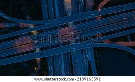 Aerial drone photo of ring road   multilevel circular junction road, road junction. Aerial view of the transportation, traffic, route road and expressway  in the city in Thailand.