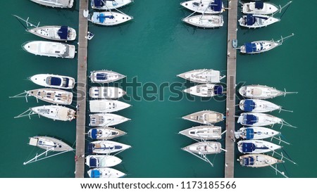 Aerial drone photo of sail boats docked in mediterranean destination port