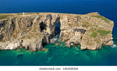 Aerial Drone Photo Of Small Islet Of Tsihli Baba With Iconic Rocky Arch And Monument Of French Naval Forces In Battle Of Navarino Next To Sfaktiria Island, Pylos, Peloponnese, Greece